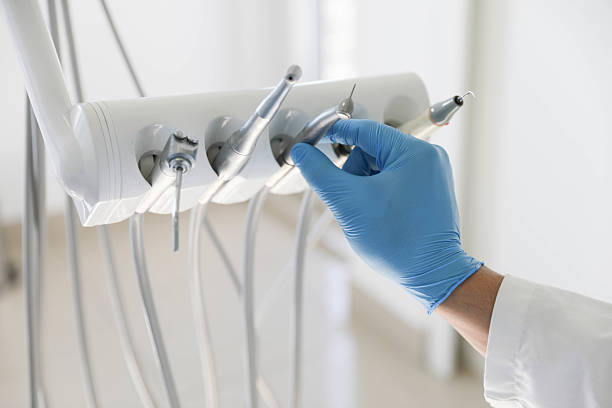 Professional Tooth Extraction technician working in Navy, VA